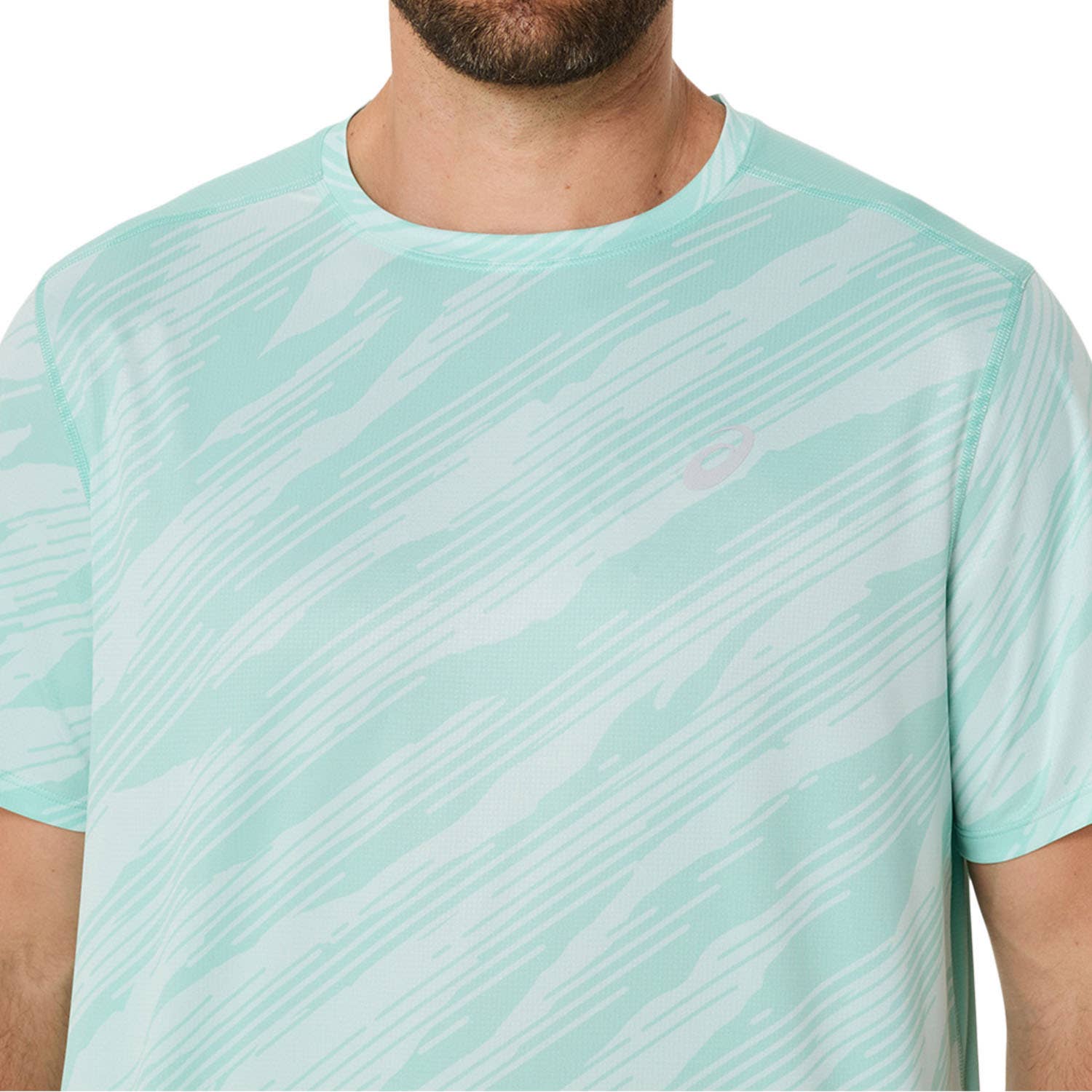 CAMISETA ASICS CORE ALL OVER PRINT SS TOP VERDE