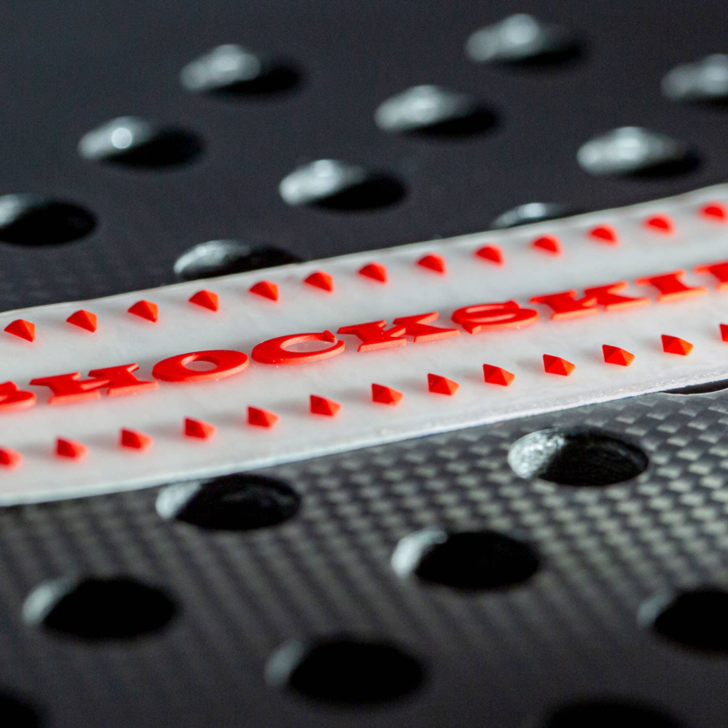 PROTECTOR SHOCKOUT SHOCKSKIN TRANSPARENTE/ROJO