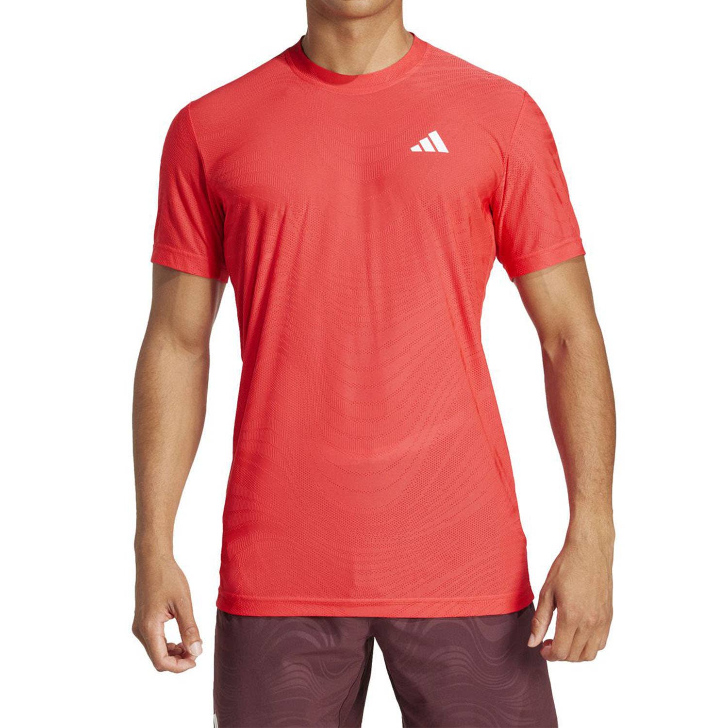 CAMISETA ADIDAS FREELIFT PRO KWY74 HOMBRE CORAL