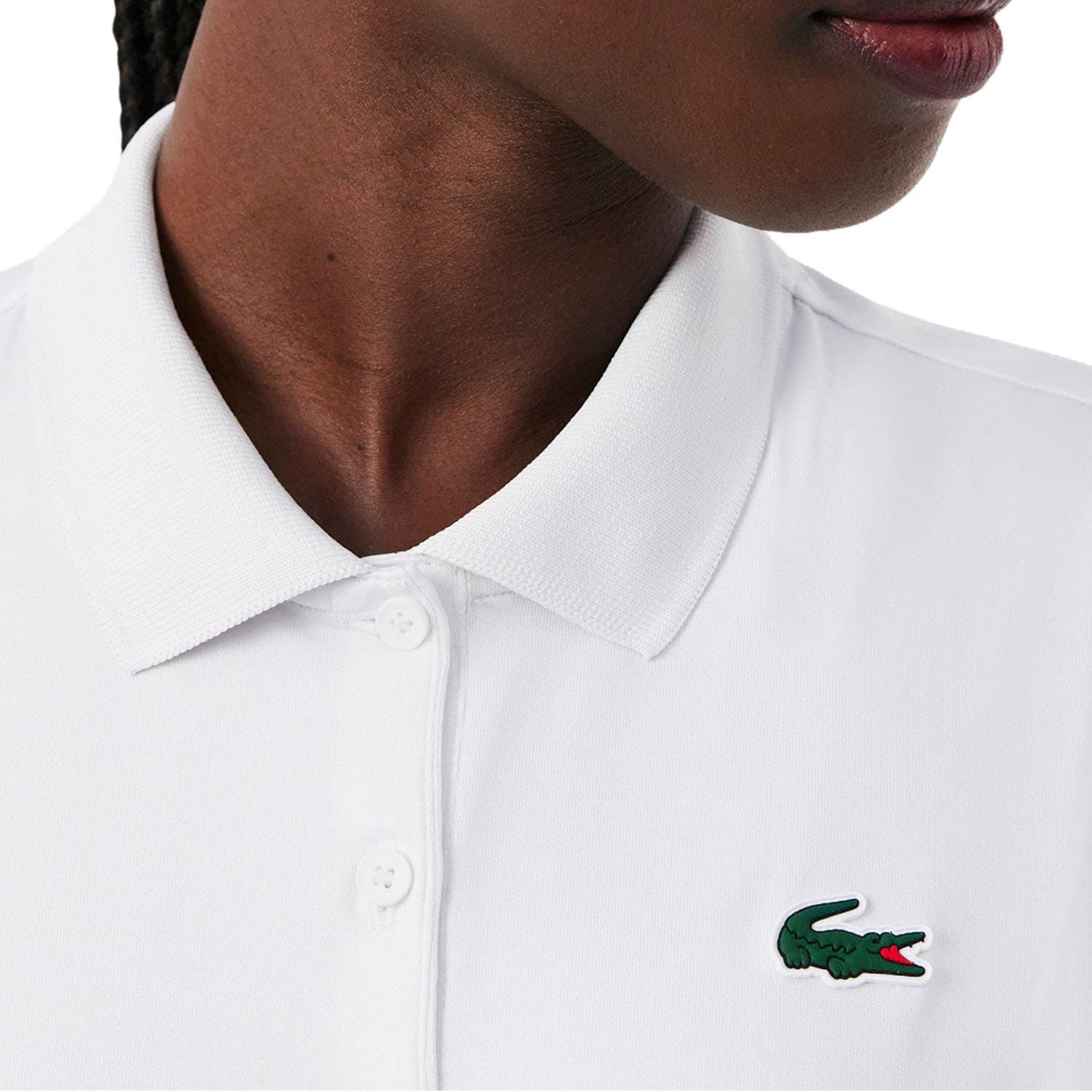 POLO LACOSTE CORE PERFORMANCE MUJER BLANCO